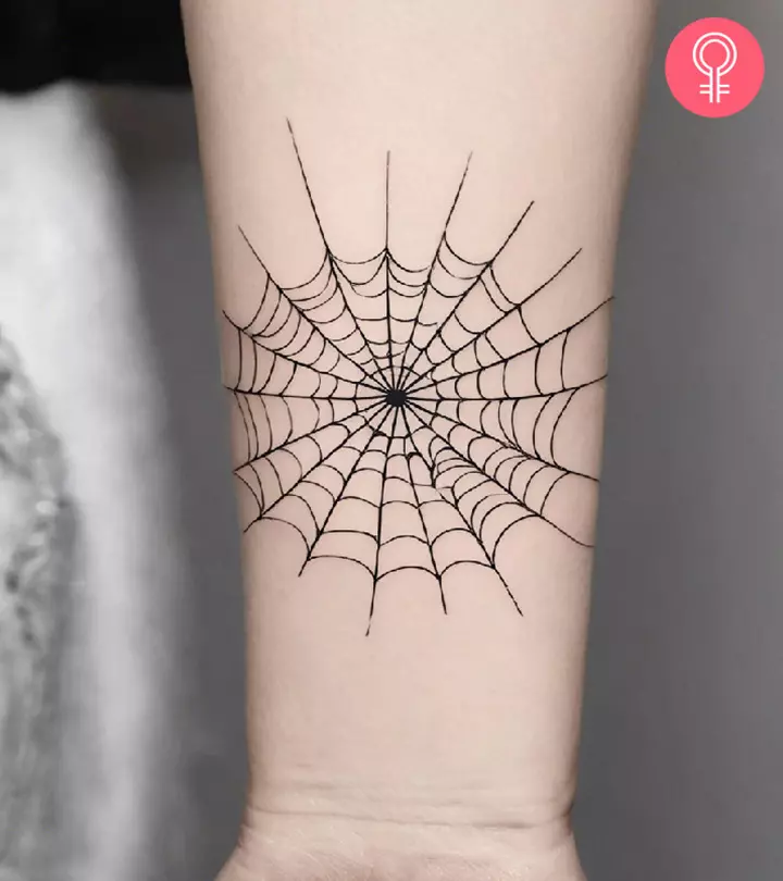 side spider web tattoo