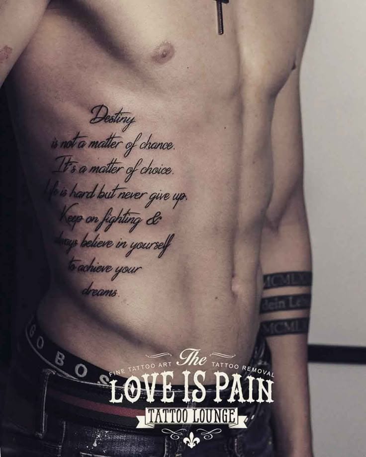 a rib tattoo with quote in script font