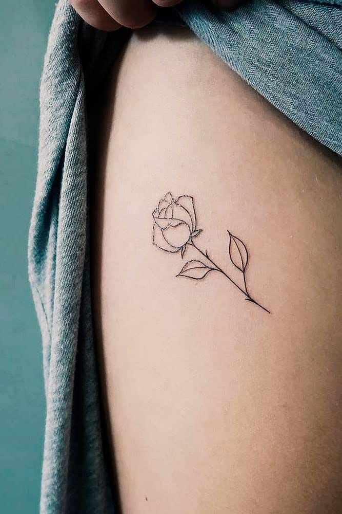 small thigh rose tattoo