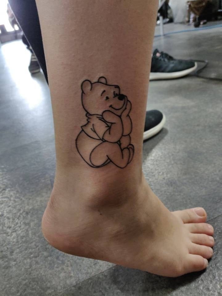pooh sitting tattoo