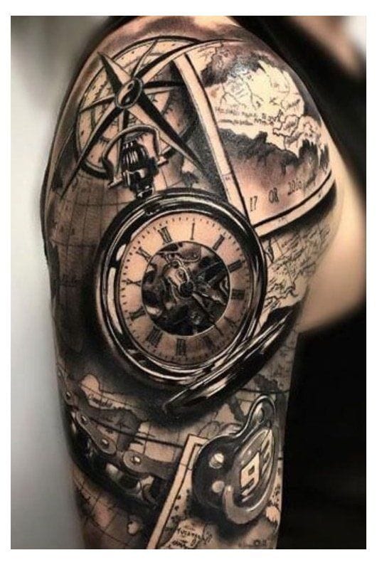 an upper arm tattoo with a clock