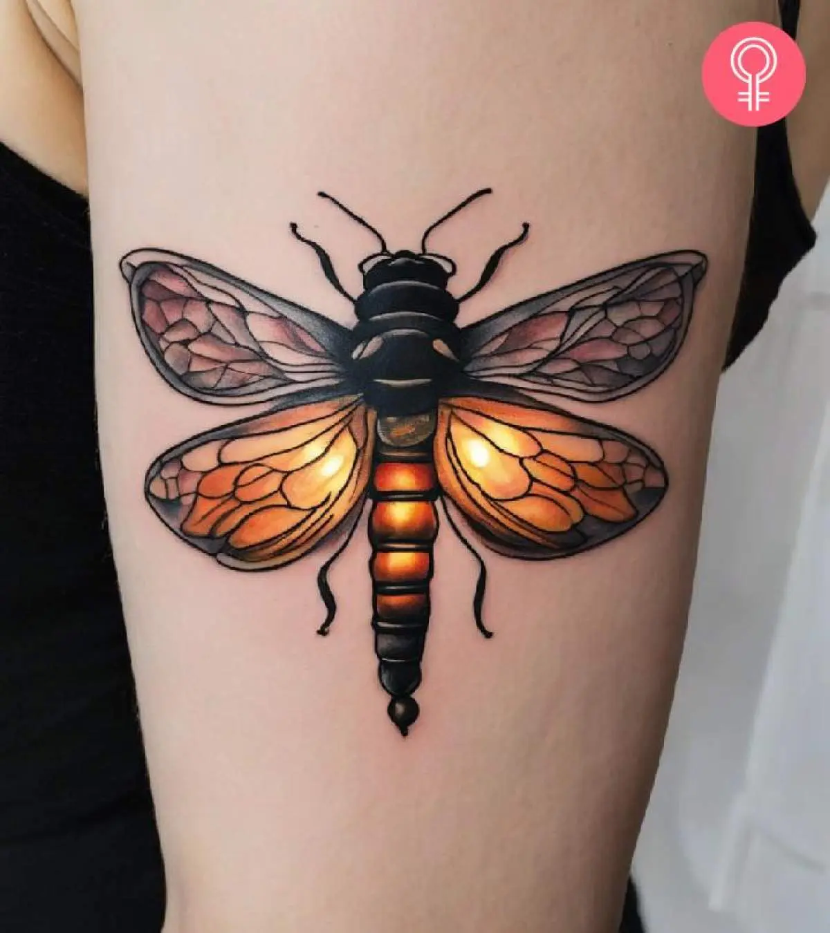 a beautiful firefly tattoo with single silhouette