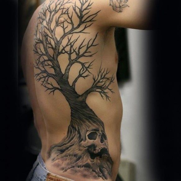 a ribs tattoo with tree of life