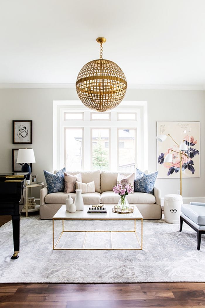 a small living room with light paint