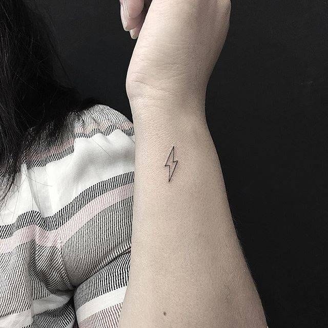 minimalistic lightning tattoo