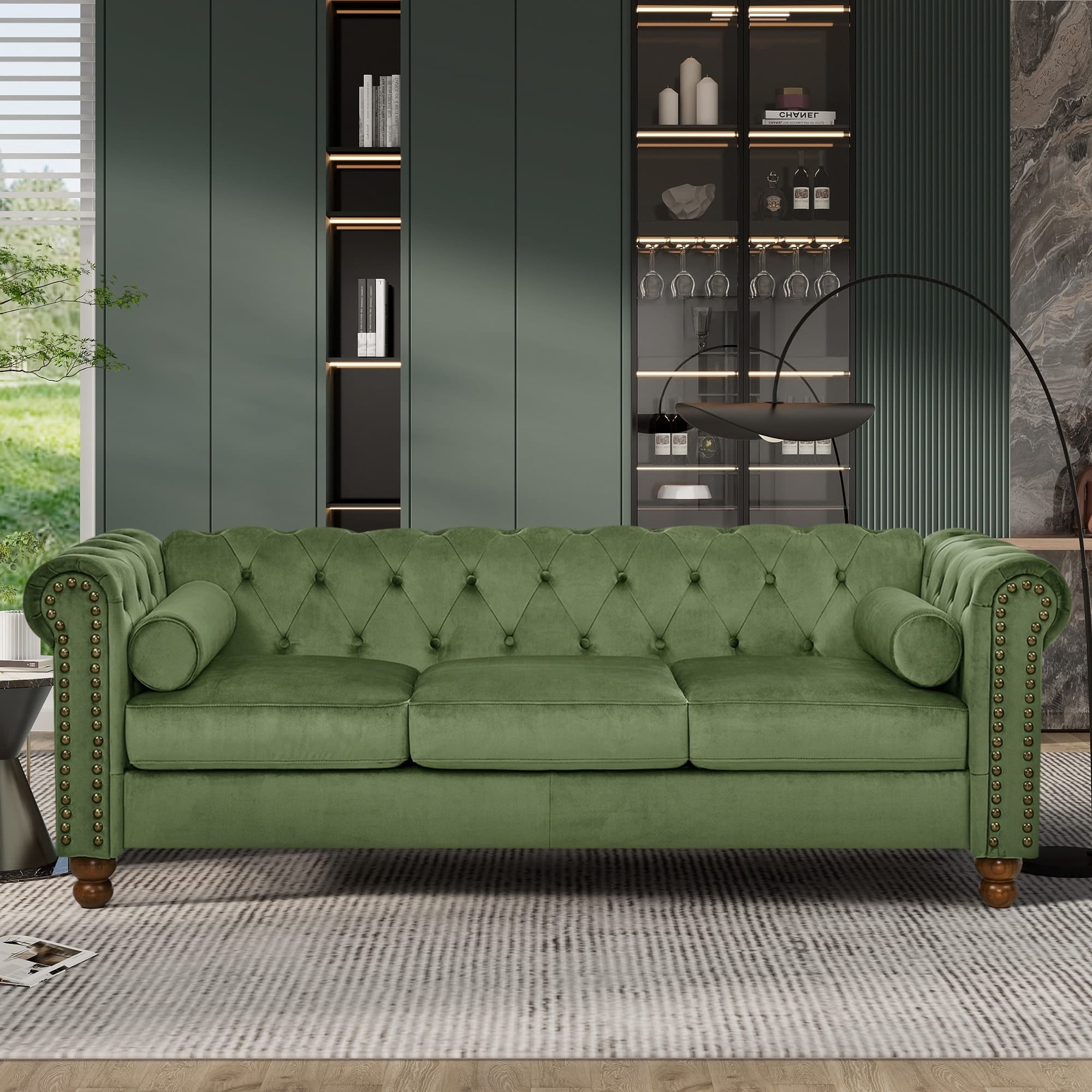 living room with apple green velvet sofa with rolled arms and button accents