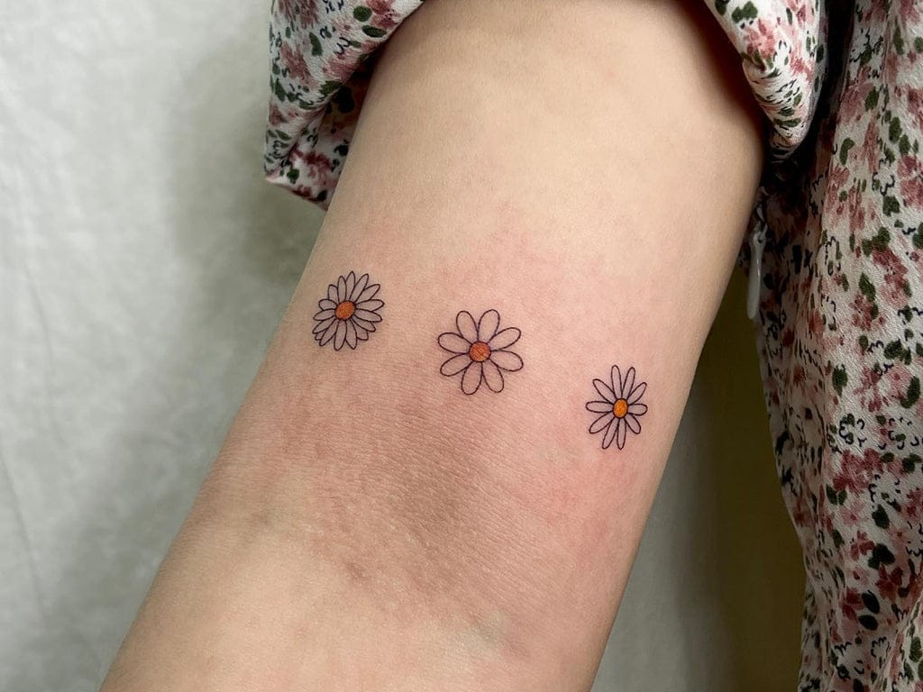 simple daisy tattoo