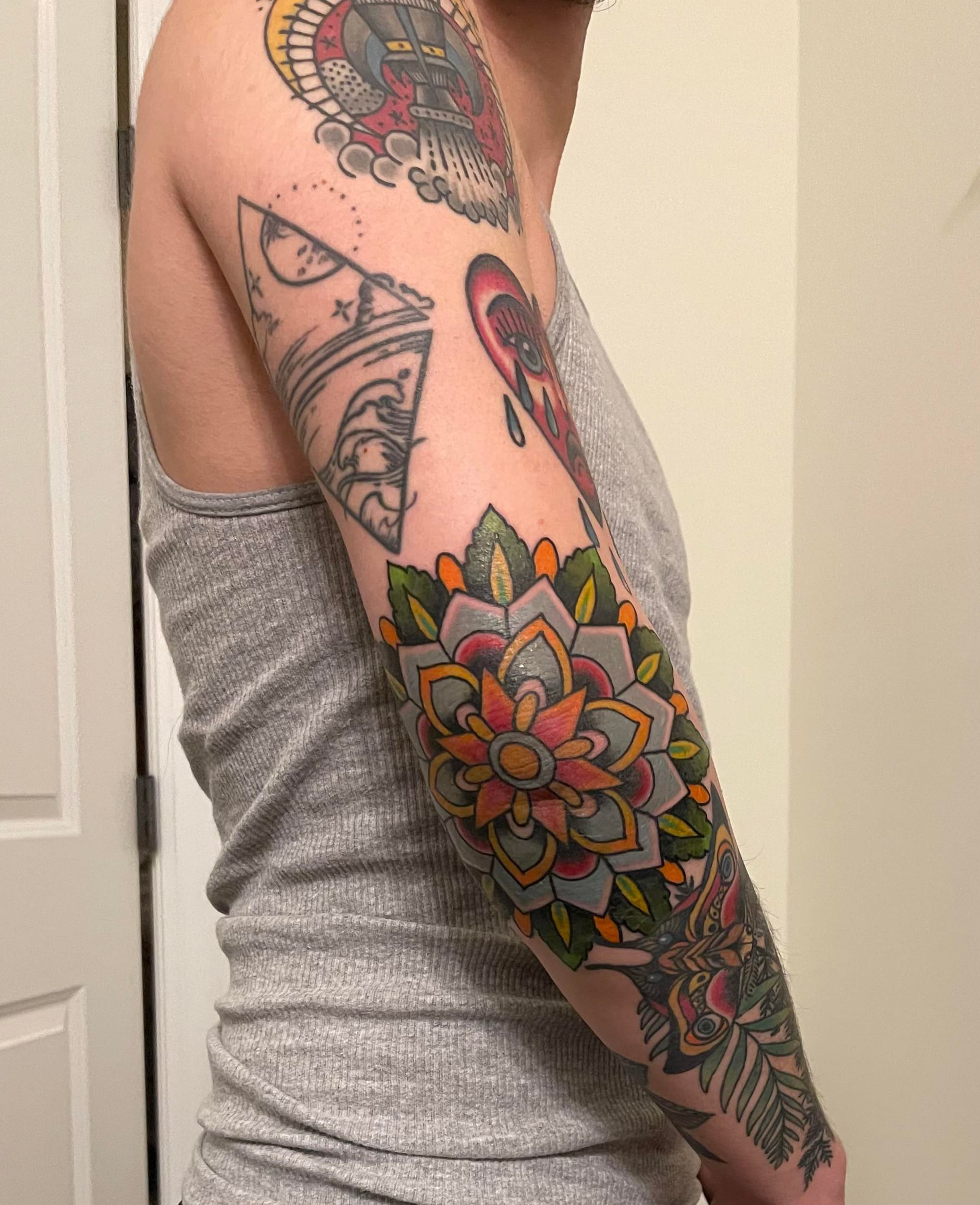 elbow floral mandala tattoo