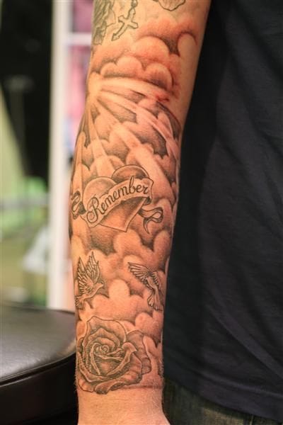 simple cloud sleeve tattoo