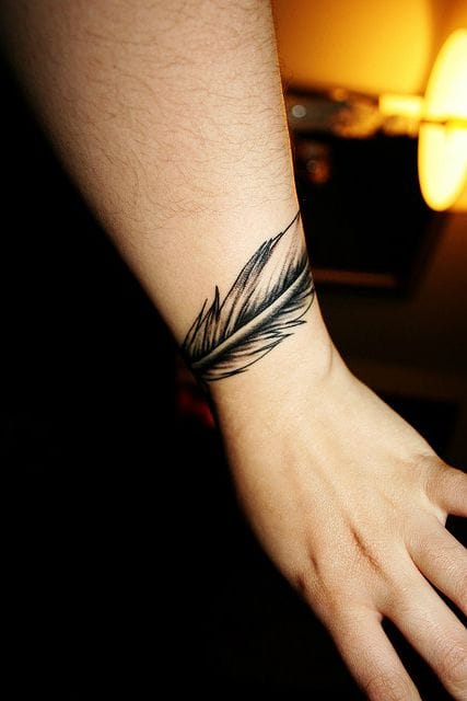 feather armband tattoo