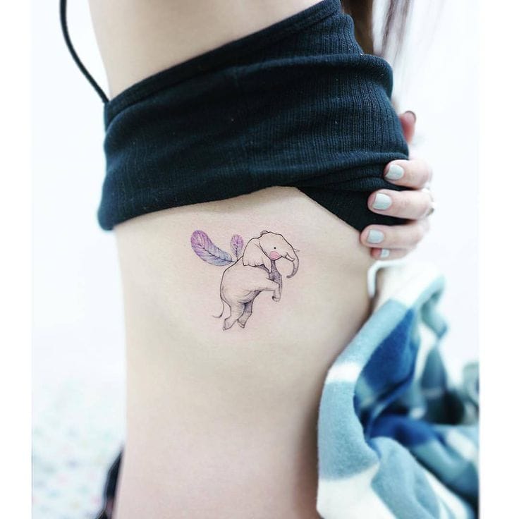 flying elephant tattoo