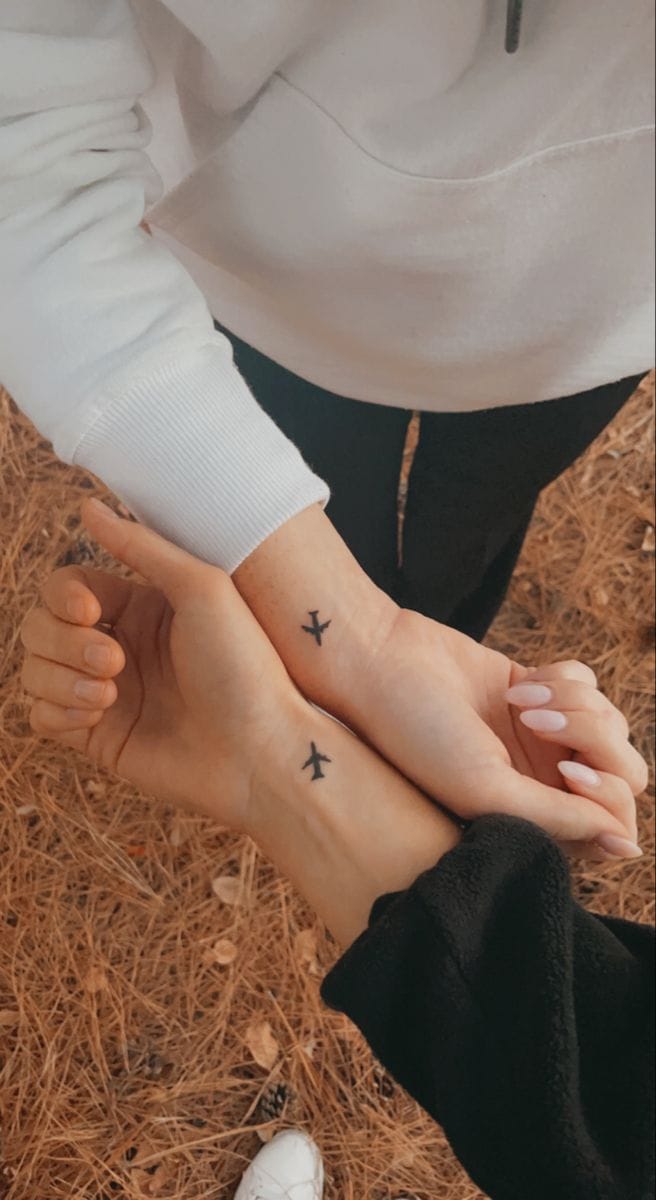 matching airplane tattoo