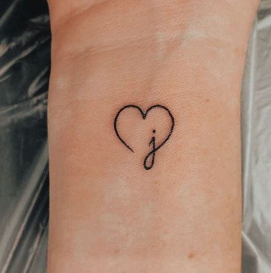 heart shaped j tattoo