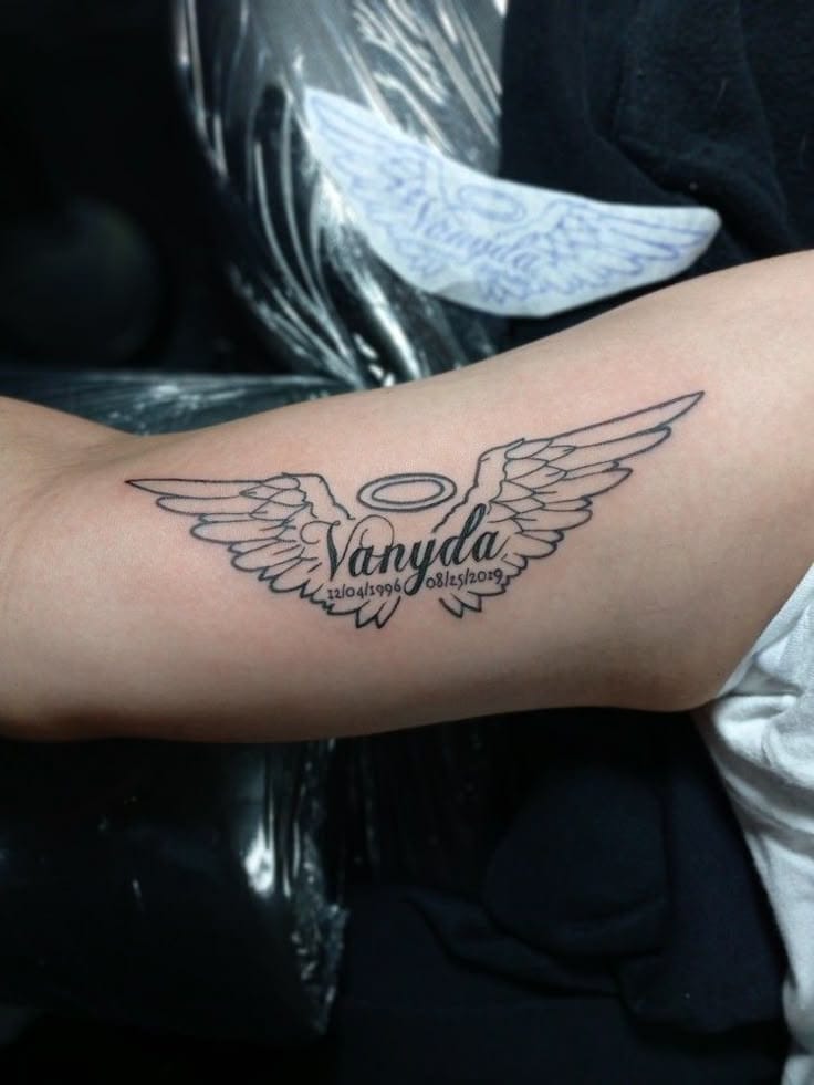 memorial angel wings tattoo