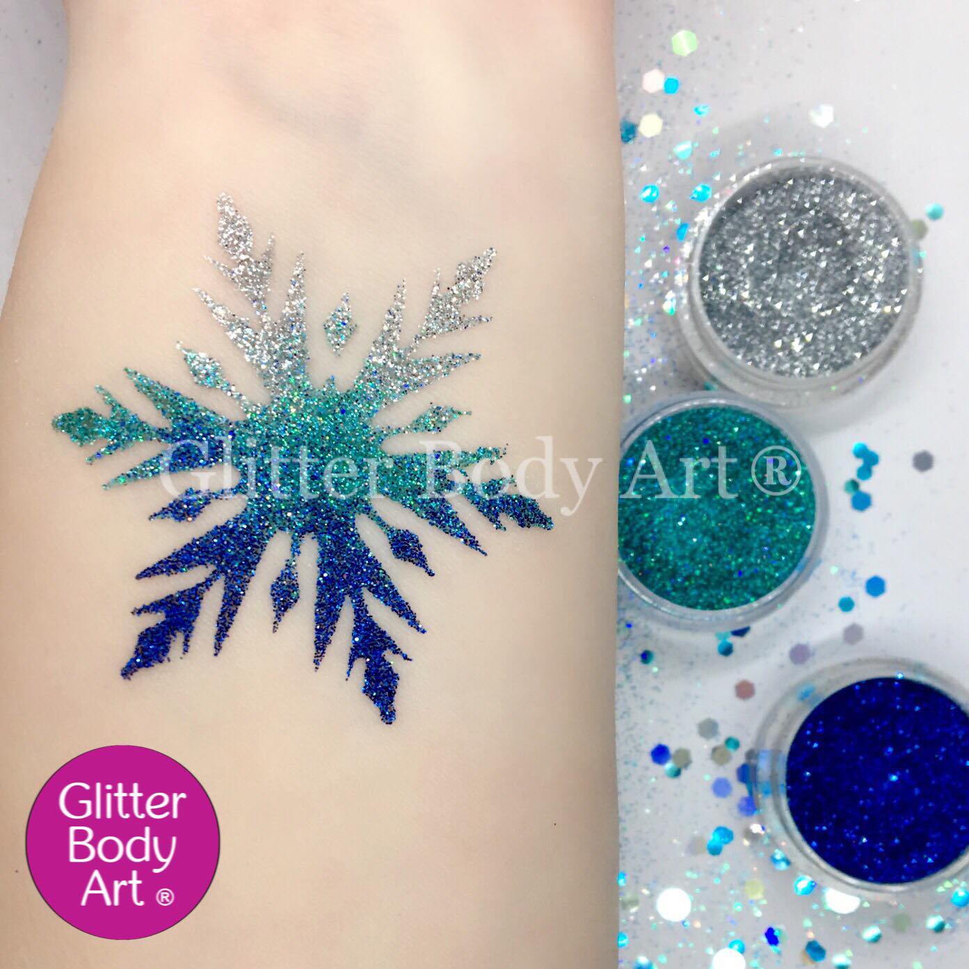 a dazzling glitter tattoo with a snowflake