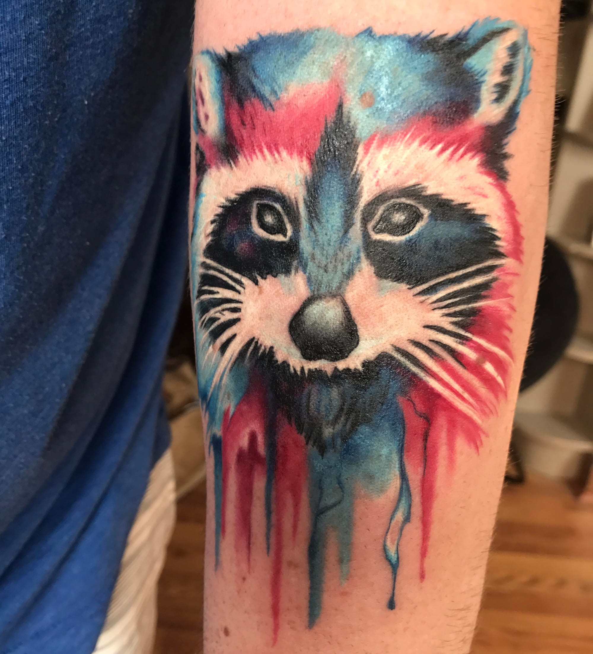 watercolor raccoon tattoo