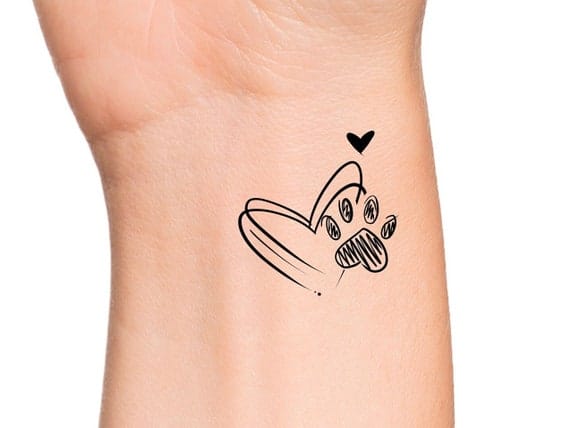 heart shaped paw tattoo