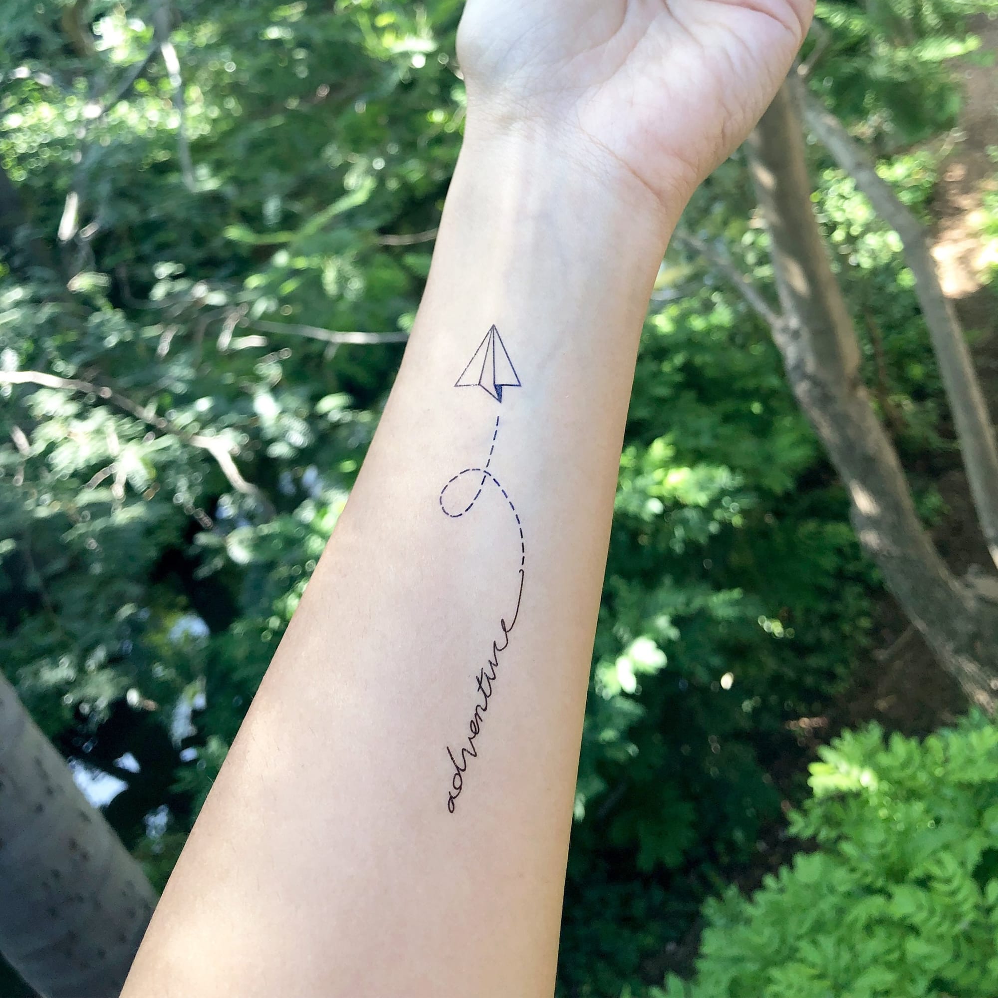 paper airplane tattoo