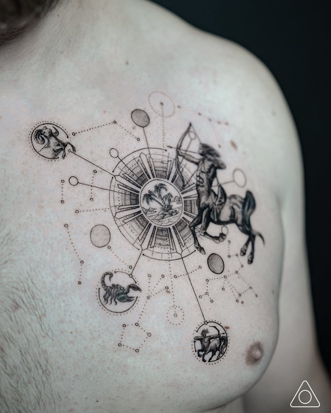 upper arm with constellation tattoo in dotwork style