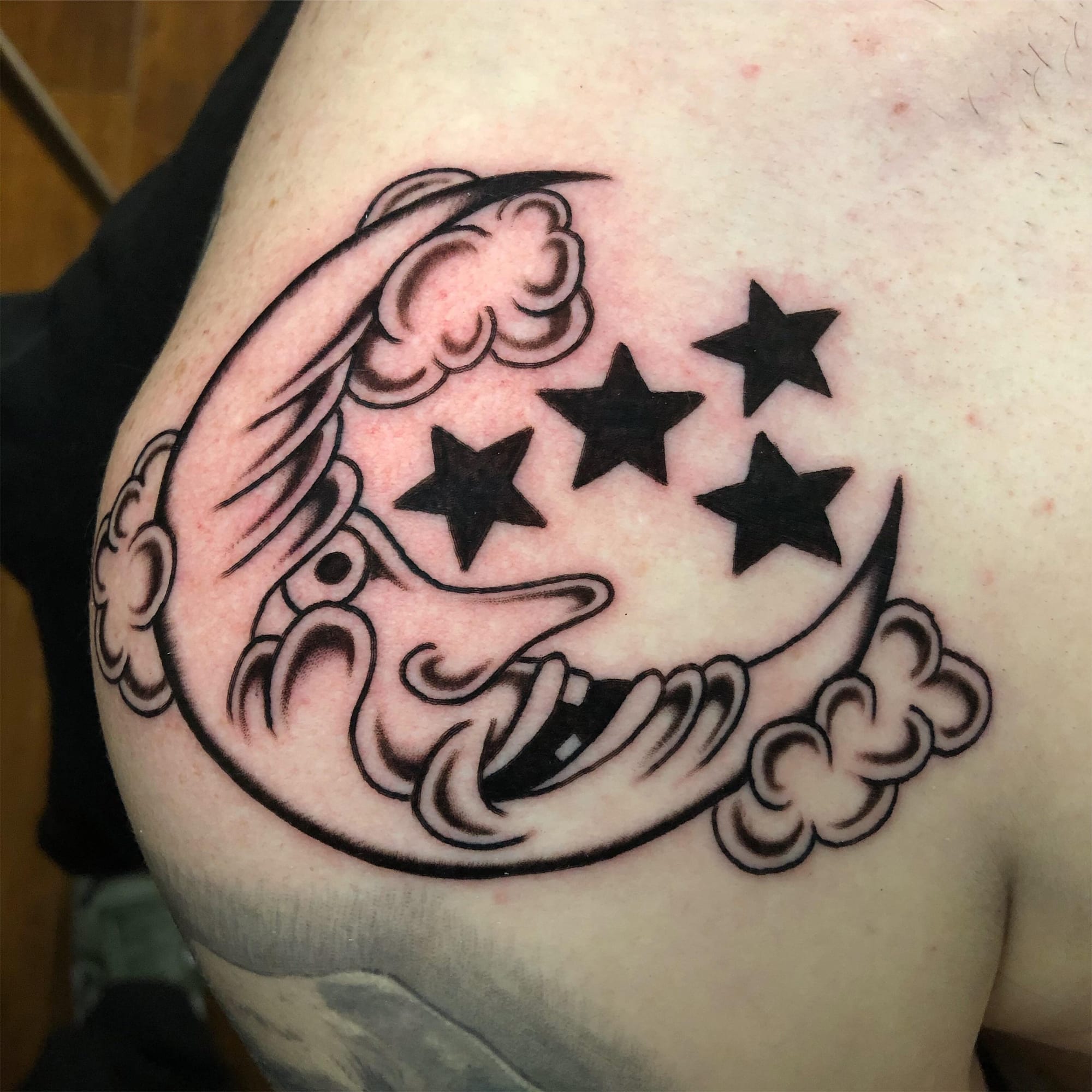 traditional moon tattoo