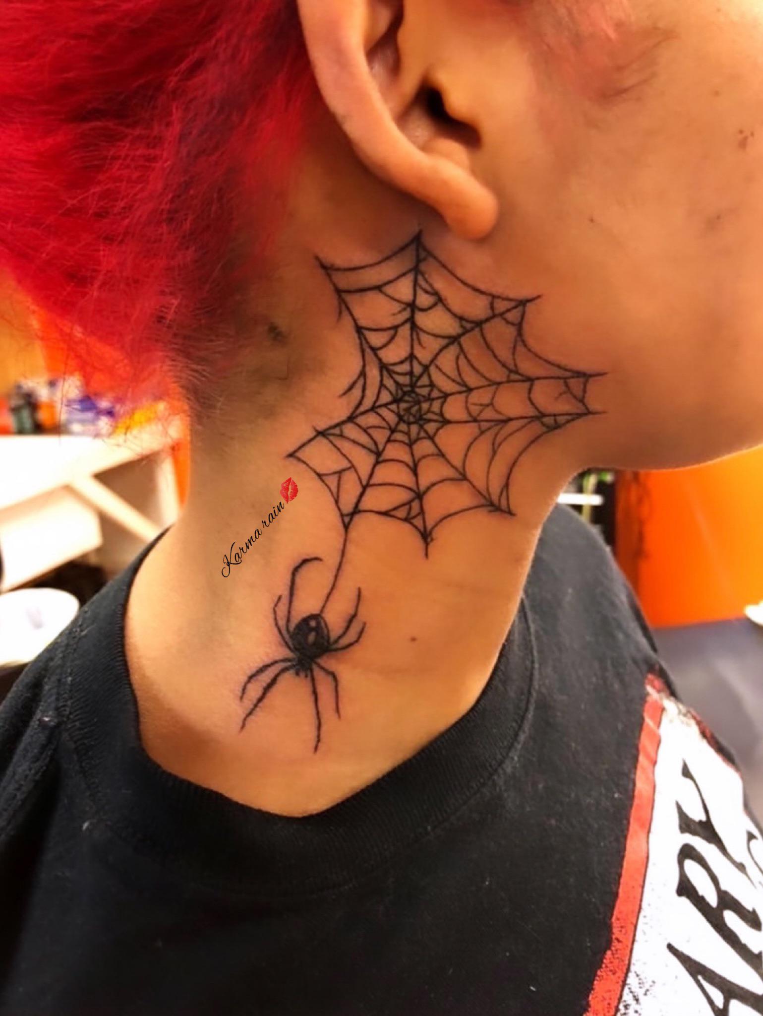 spider neck tattoo