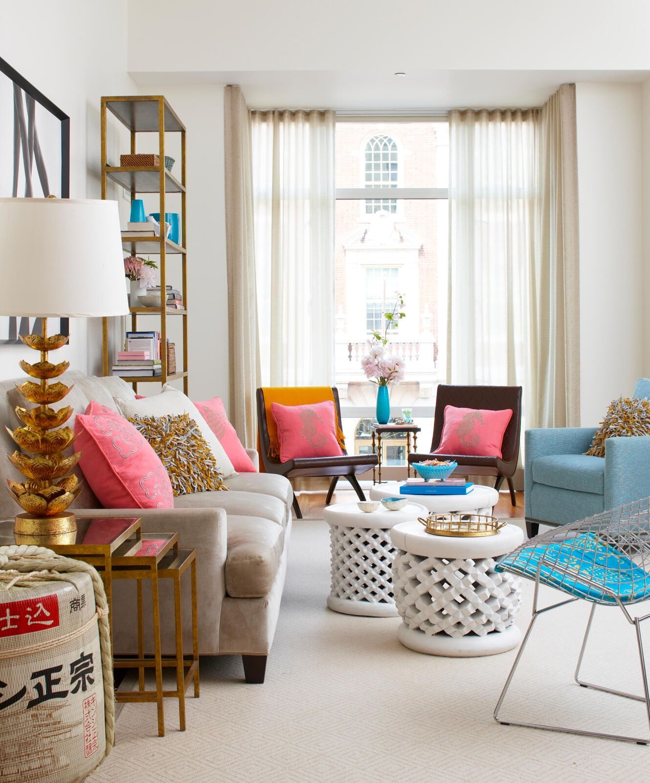 a bright mini living room with sheer curtains