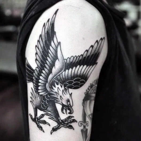 upper arm with classic american traditional eagle tattoo
