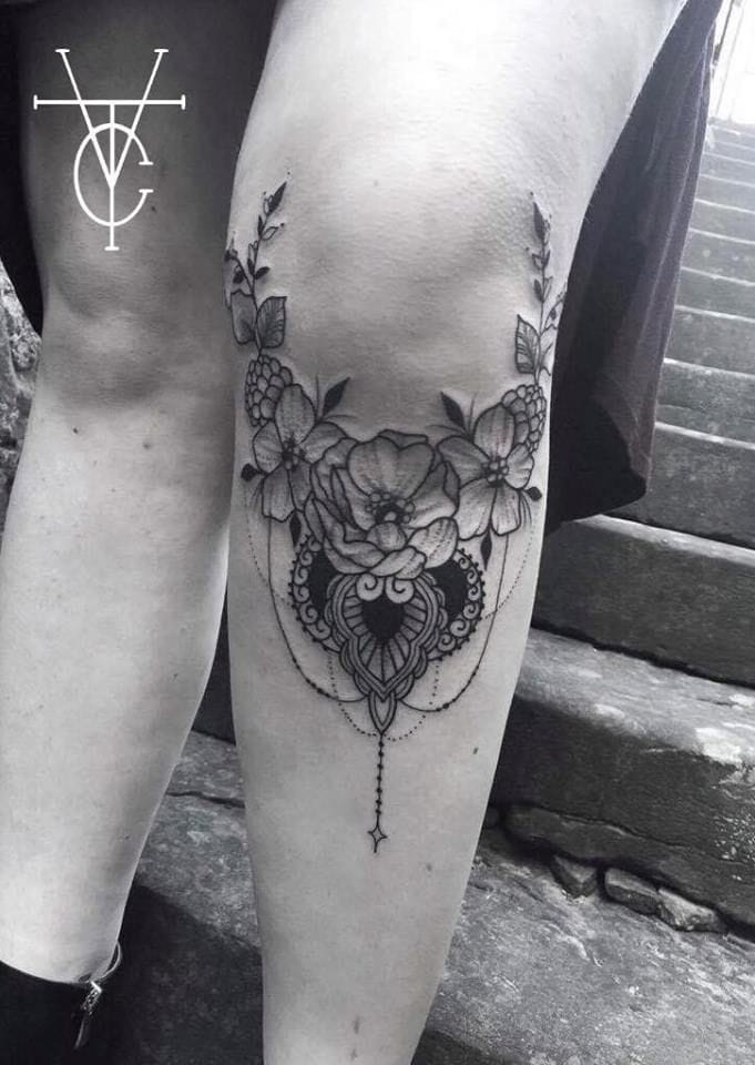 ornamental knee tattoo