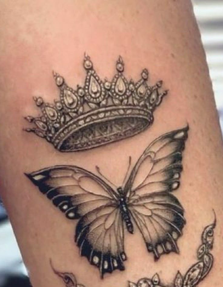 butterfly adorned crown tattoo