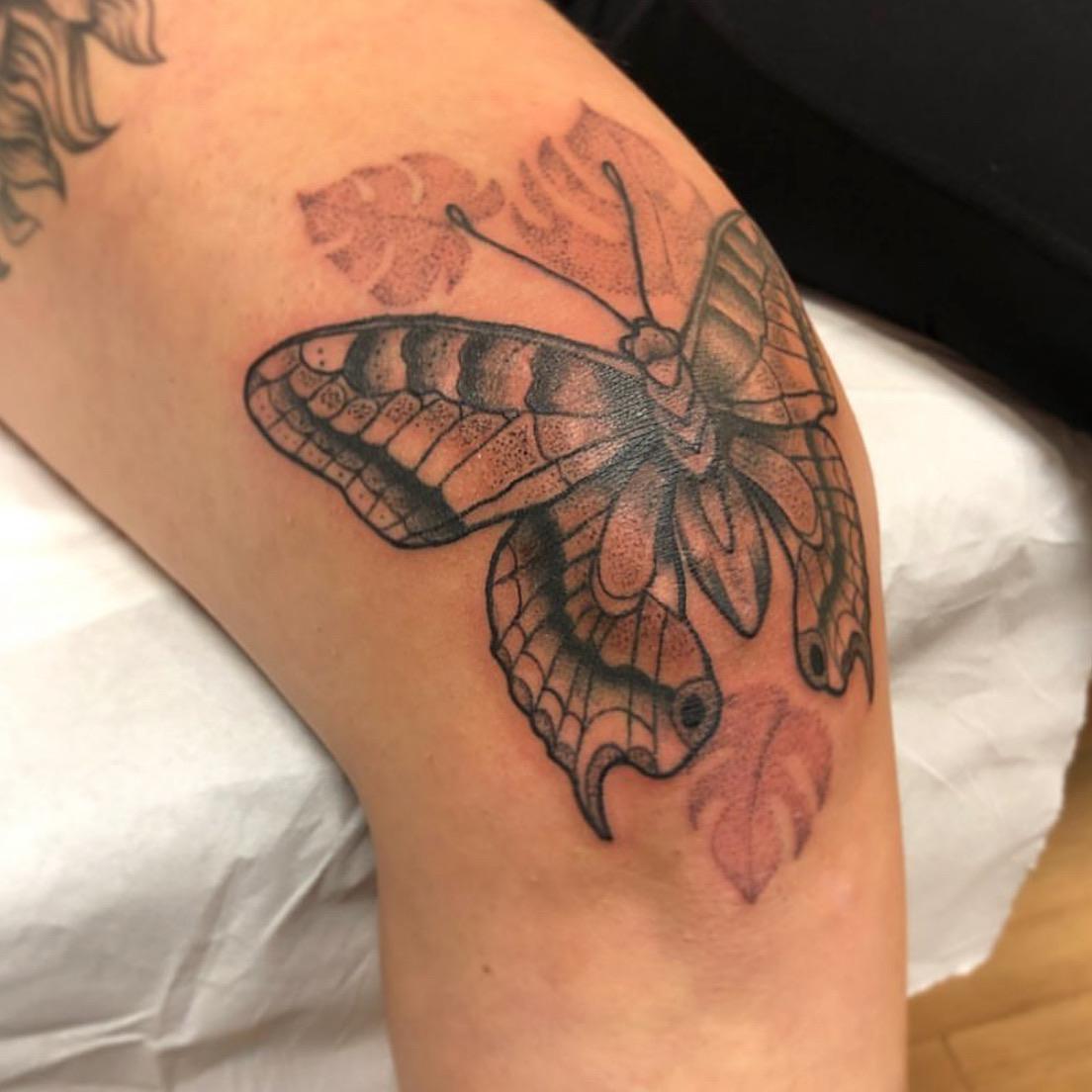 butterfly knee tattoo