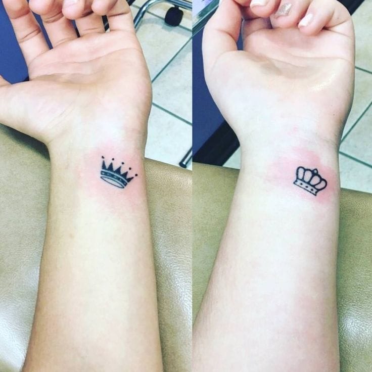 small wrist crown tattoo