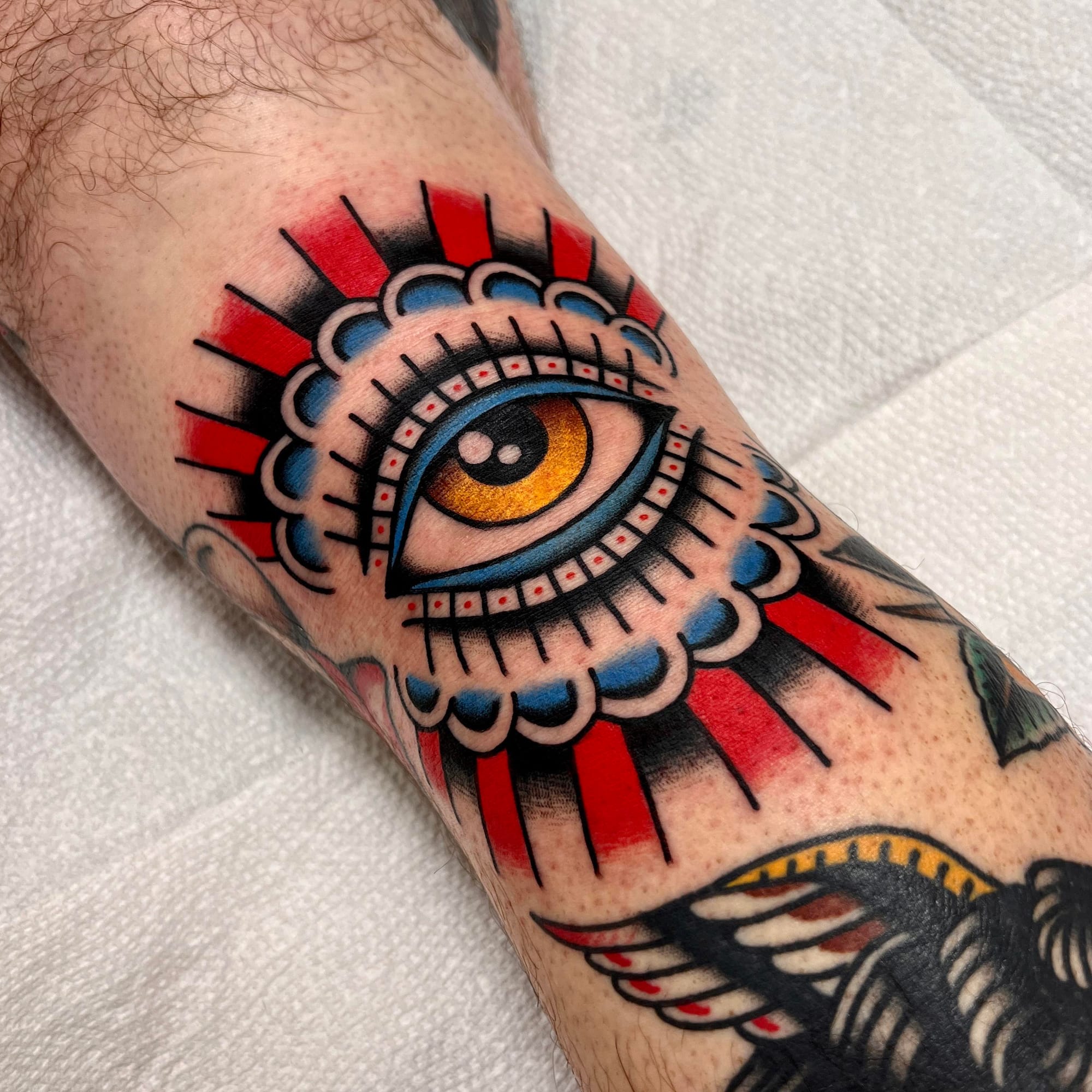 eye knee tattoo