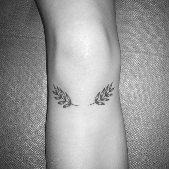 minimalist knee tattoo
