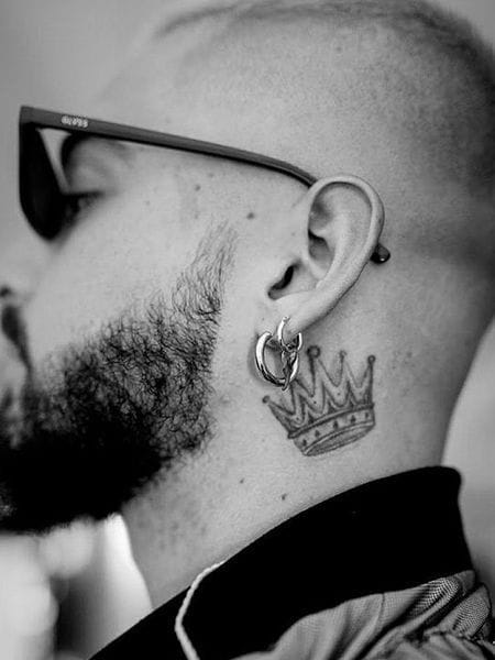 neck tattoo with crown