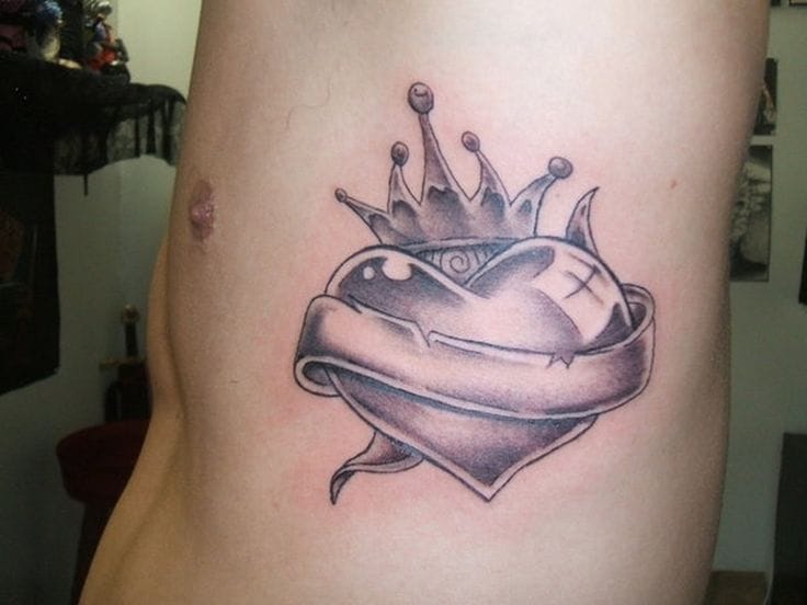 heart topped crown tattoo
