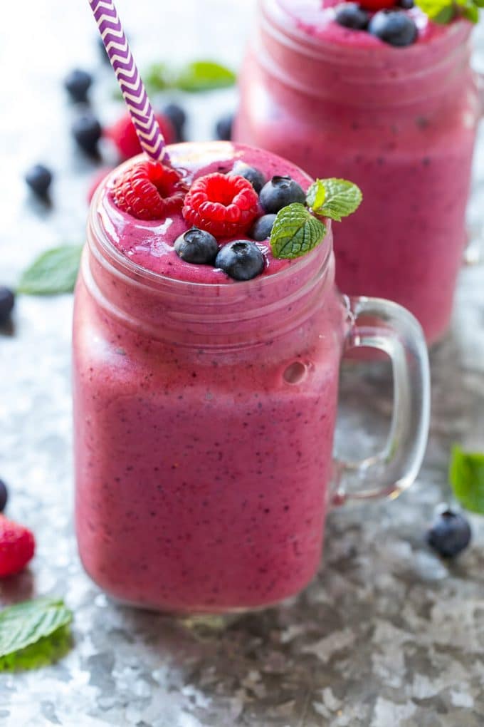 a colorful fruit smoothie with berries