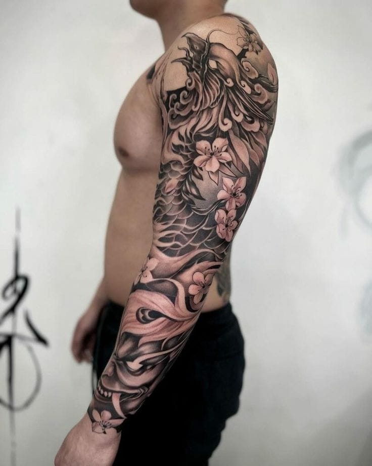 Flowing like liquid poetry across the entire arm, this masterful black and gray sleeve weaves together mythical dragon scales, delicate cherry blossoms, and swirling wind elements in perfect harmony. The artist's incredible attention to detail creates stunning depth and movement, making each element appear to dance beneath the skin. A true testament to Japanese-inspired tattooing at its finest 🌸