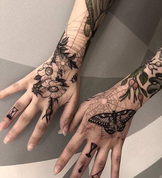 Delicate botanical linework transforms both hands into a garden sanctuary, with sunflowers blooming across one palm while a magnificent butterfly takes flight on the other. The intricate web of fine lines and nature motifs creates a cohesive sleeve design that celebrates the symbiotic relationship between flora and fauna 🌻 Each finger detail adds to the overall tapestry, making these hands living canvases of natural beauty.