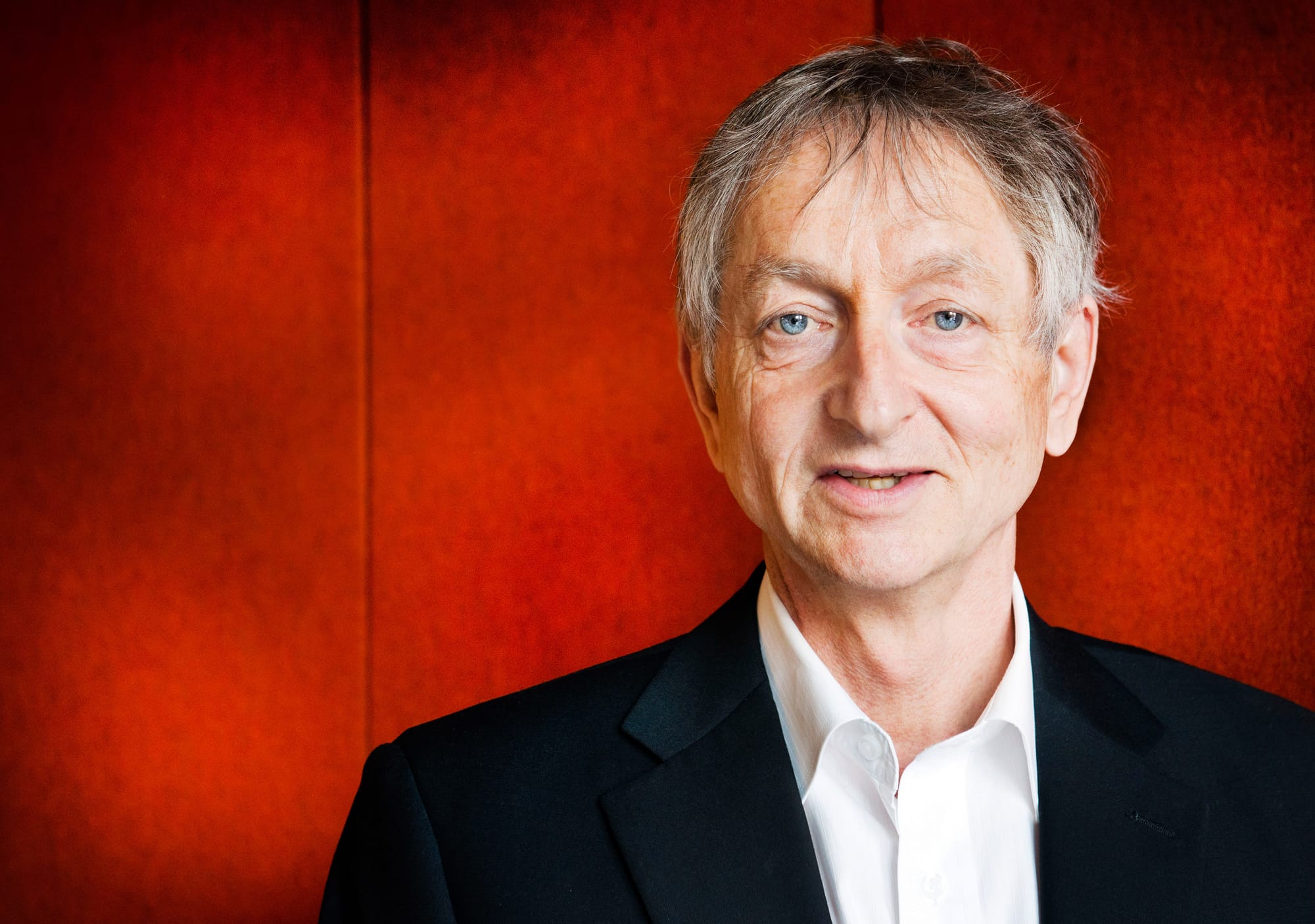 MIT Technology Review headline about Geoffrey Hinton quitting Google.
