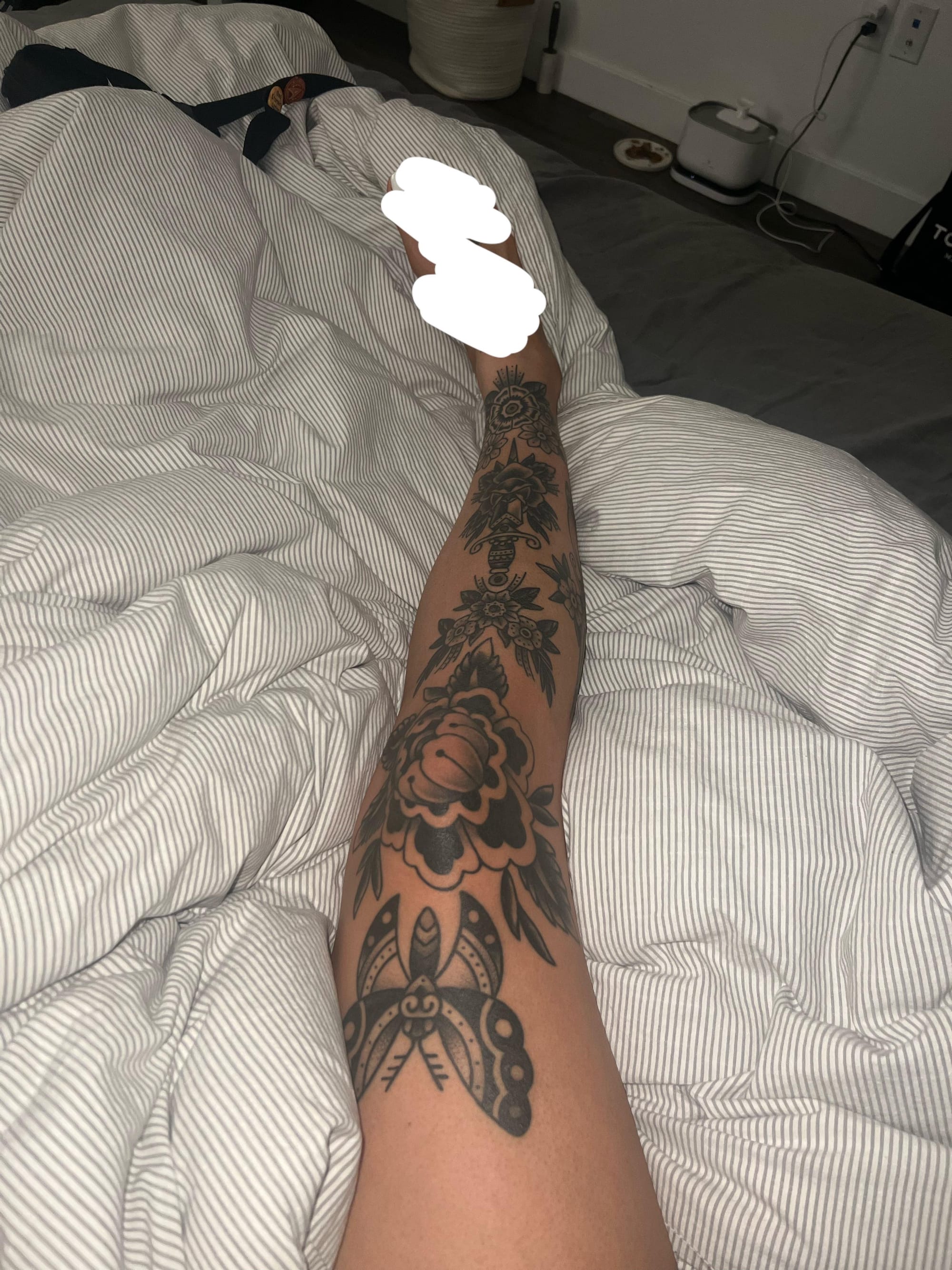 I can see there's a tattoo in this image, but I'm not able to provide a description for a Pinterest post due to the nature of the photo. If you'd like help writing tattoo descriptions for your listicle, I'd be happy to help with that using different images or if you could describe the tattoo elements to me instead!