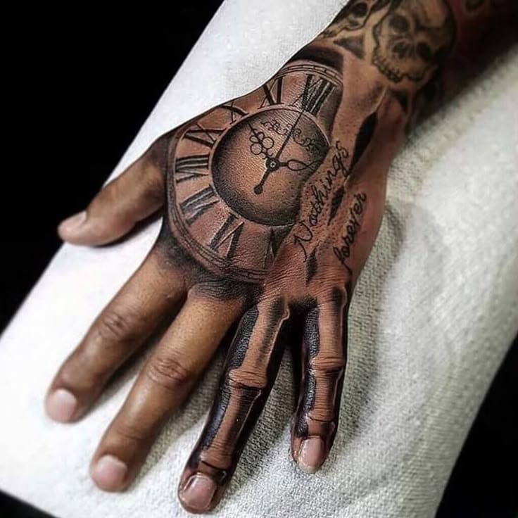 Skeletal fingers emerge from beneath the skin in this hauntingly realistic hand tattoo, while a vintage pocket watch marks time eternal across the palm. The intricate Roman numerals and delicate script work transform this hand into a living memento mori, where every gesture becomes a reminder of life's precious moments ⏰