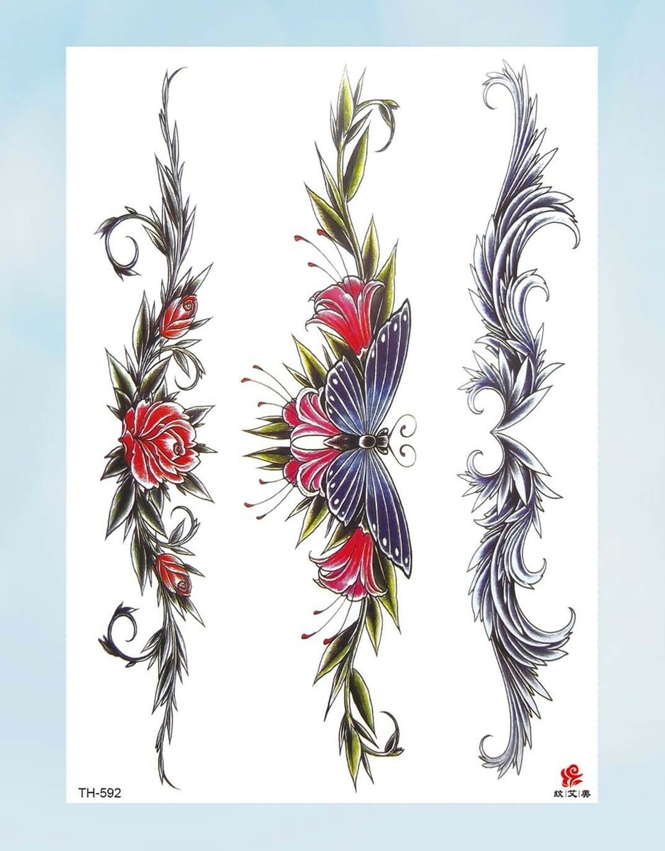 Delicate botanical artistry meets ethereal beauty in this stunning trio of vertical designs, where crimson roses bloom alongside graceful butterflies and flowing feather motifs. The intricate linework and ornate flourishes create perfect spine, thigh, or ribcage placement options that would flow beautifully with your body's natural curves. Each element tells its own story of transformation and growth while maintaining an elegant, cohesive aesthetic 🌹