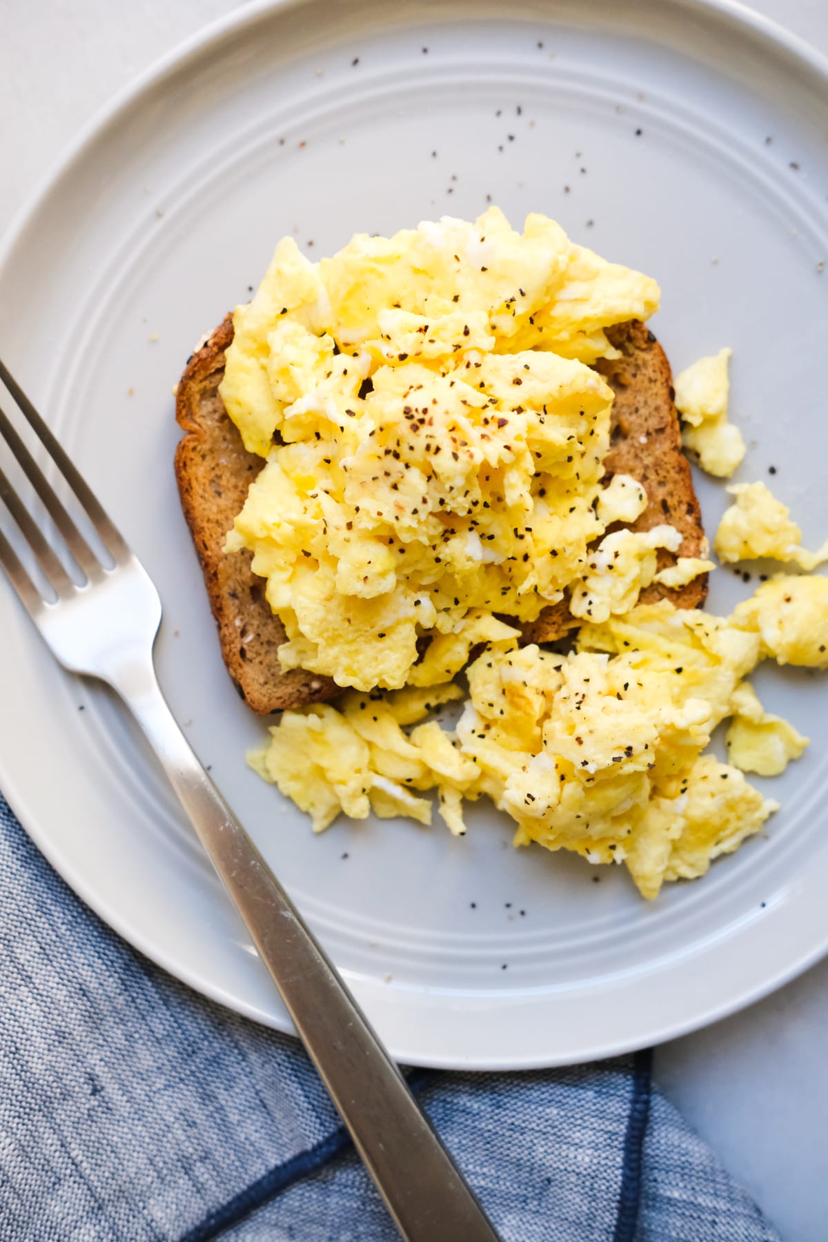 This Secret Ingredient Makes Scrambled Eggs Fluffier Than Clouds