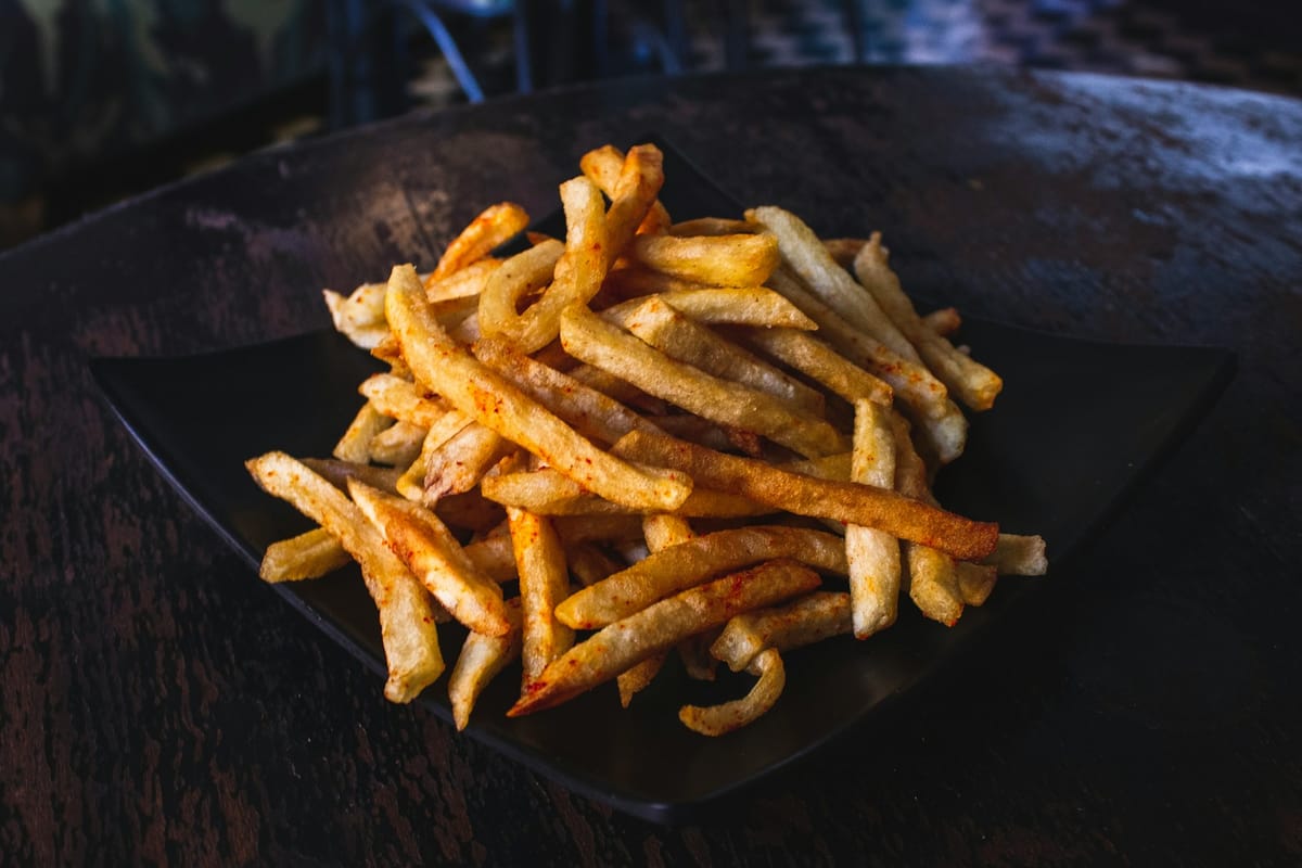 The Secret Trick Restaurants Use to Make Their Fries So Addictive